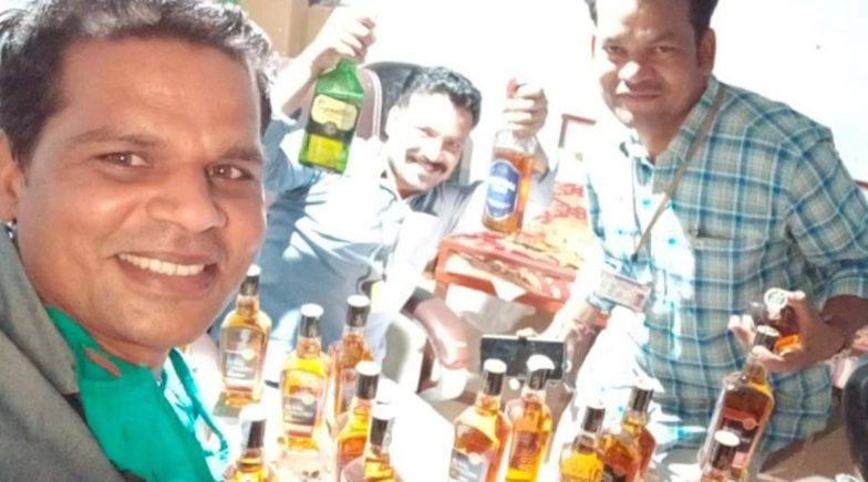Madhya Pradesh: Three Revenue Department Officials Suspended For Picture With Liquor Bottles