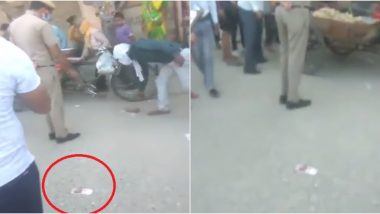 Fear of Coronavirus or Act of Honesty? Delhi's Budh Vihar Residents Hesitate to Touch Rs 2000 Lying on Road, Inform Police (Watch Video)