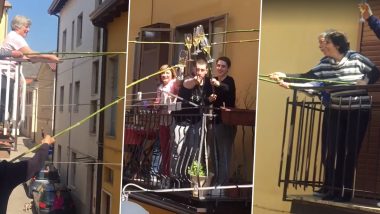 Italian Neighbours Enjoy Drinks in Quarantine by Clinging Glasses With Support of Poles From Balconies (Watch Viral Video)