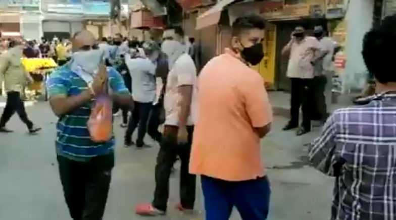 Man Showers Petals on People Outside Liquor Shop in Delhi for Helping the Economy, Govt