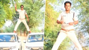 Madhya Pradesh: Sub Inspector Manoj Yadav Performs 'Singham Stunt' by Balancing Self on Two Moving Cars in Damoh, Fined Rs 5,000; Watch Viral Video