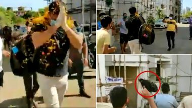Mumbai Police ASI Kiran Pawar Receives Grand Welcome As He Reaches Home After Recovering From COVID-19, Neighbours Shower Flowers; Watch Video