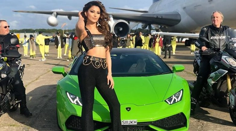 Urvashi Rautela Steal Our Attention Alongside a Stylish Sportscar 