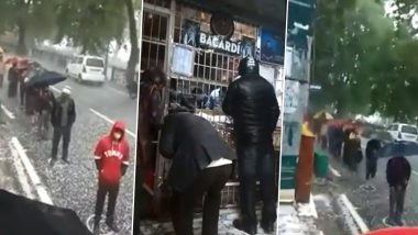 Uttarakhand: Booze Lovers Brave Hailstorm Outside Liquor Shop in Nainital's Mall Road, Watch Video