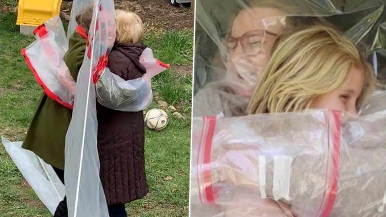 Hug Gloves to Embrace Your Loved Ones! People Are Hugging Each Other Through Plastic Sheets During Lockdown (Watch Heartwarming Videos)