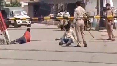 Uttar Pradesh: Cop Suspended in Hapur After Video of Him Beating Labourers and Making Them Roll On Road Goes Viral