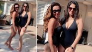 Sunny Leone Slips into her Black Monokini as She Enjoys her Swimming Date with a Friend in Los Angeles