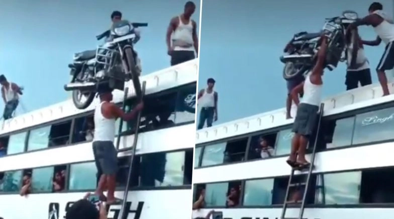 Man Carrying Bike on His Head to Keep it on Bus Without Any Safety Measure Goes Viral