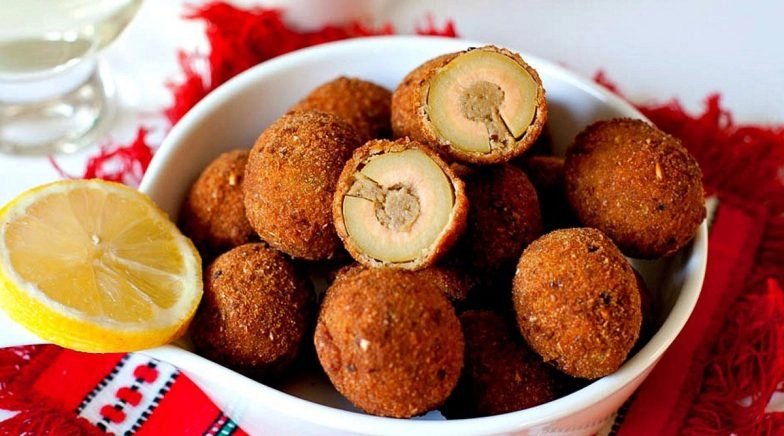 Italian Woman Prepares Traditional Stuffed Olives During Brain Tumour Operation
