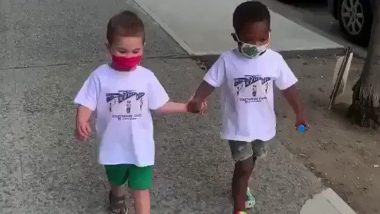 black kids hugging each other