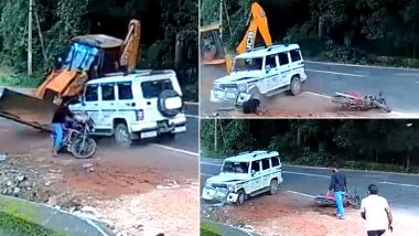 Narrow Escape! Biker's Life Saved After Mahindra Bolero Crashes Into an Oncoming JCB That Lost Control And Was About To Hit The Man (Watch Shocking Video)