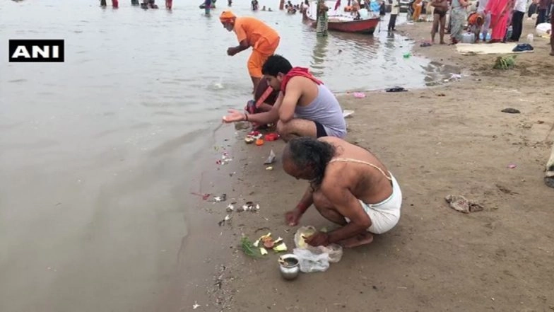 Guru Purnima 2020: Devotees Gather, Take Holy Dips at Sangam Ghat in Uttar Pradesh