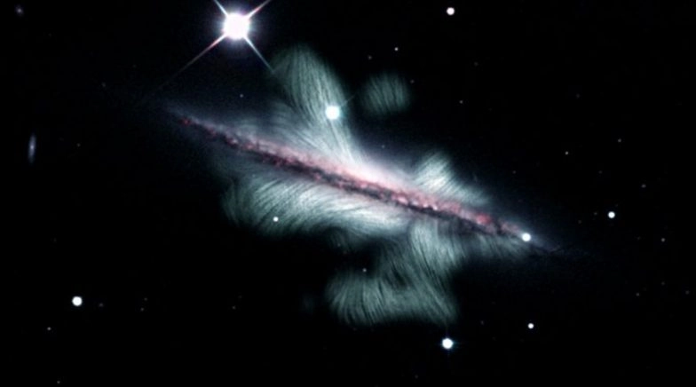 NRAO Release New Image Showing Huge Extent of Spiral Galaxy's Magnetic Field