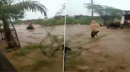Maharashtra: Motorbike Rider in Dhule Gets Caught in Flash Flood, Rescued by Locals (Watch Video)