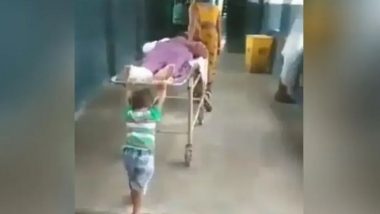 Uttar Pradesh: 6-Year-Old Boy Pushes Grandpa’s Stretcher at Deoria District Hospital, Admin Removes Ward Boy After Video Goes Viral