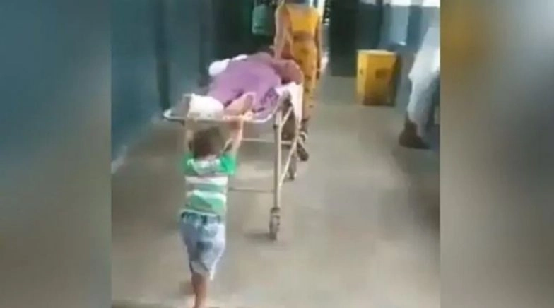UP: 6-Year-Old Boy Pushes Grandpa’s Stretcher, Admin Removes Ward Boy After Video Goes Viral