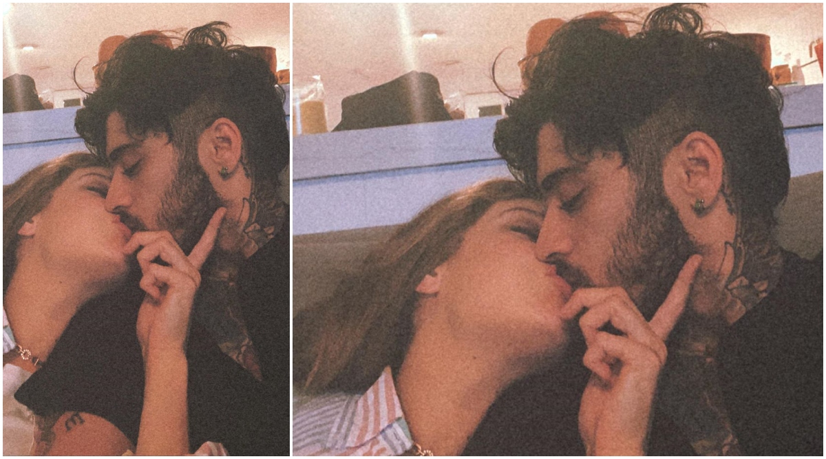 Pregnant Gigi Hadid brands Zayn Malik her 'baby daddy' as she kisses him in  rare selfie