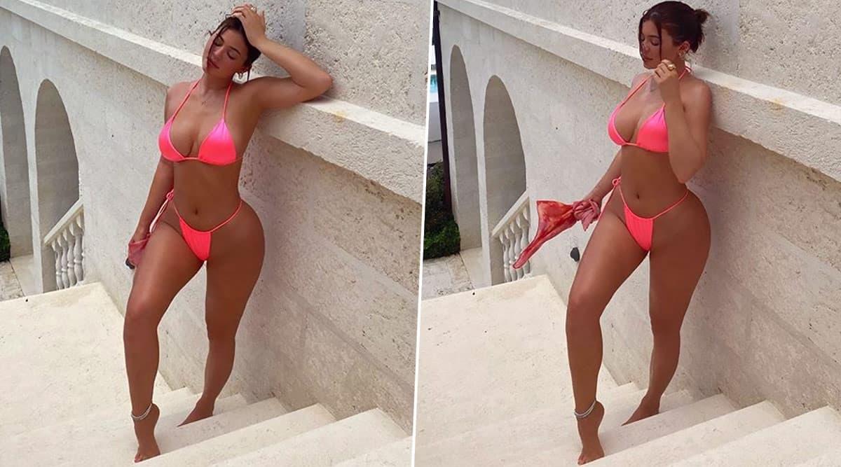 Kylie Jenner turns up the heat in tiny metallic pink bikini: See pics