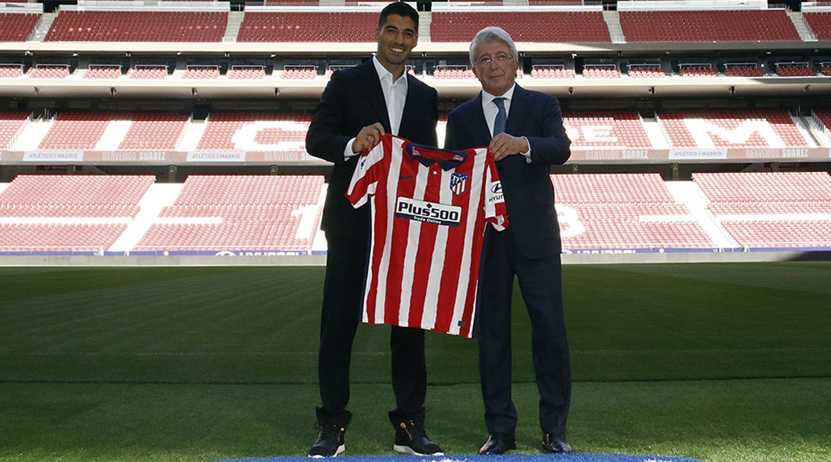 Luis Suarez smiling again as he completes Atletico Madrid transfer