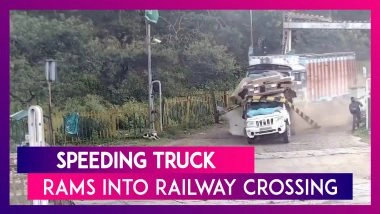 Speeding Truck Rams Into Railway Crossing Near Madhya Pradesh’s Sagar District; Viral Video Shows People Running For Their Lives