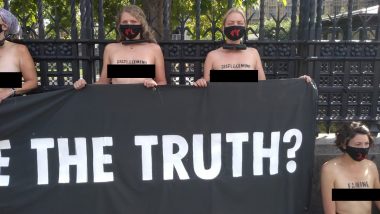 Topless Women Activists Lock Themselves to Gates of  UK Parliament in Extinction Rebellion Protest Against Climate Change