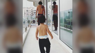 Arjun Rampal Shares Adorable Pic Twinning With Son Arik in the Balcony (See Pic)