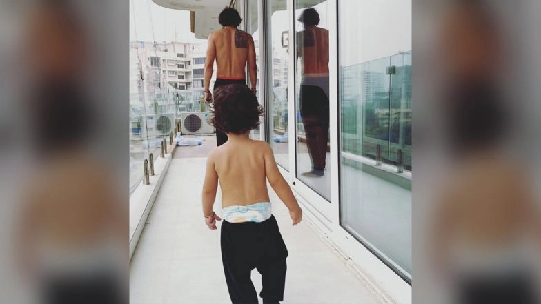 Arjun Rampal Shares Adorable Pic Twinning With Son Arik in the Balcony (See Pic)