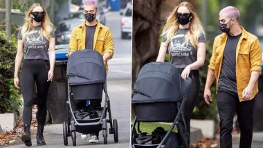 Sophie Turner and Joe Jonas Step Out with Baby Willa for a Stroll and His Pink Hair Has Our Attention (View Pics)