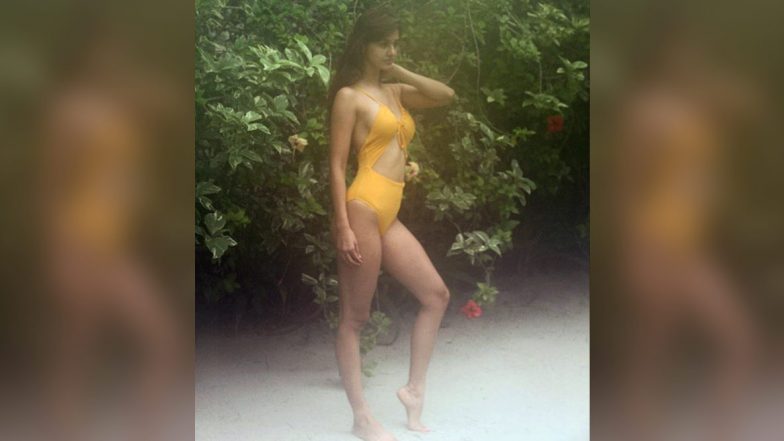 Disha Patani Looks Super Hot In a Yellow Ochre Cutout Monokini! (View Pic)