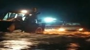 Telangana Rains: JCB Pulls Out 2 Cars From Overflowing Canal in Rangareddy Area, Passengers Rescued (Watch Video)