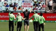 Security Breach! Protestor Invades Pitch With 'no $1bn Adani loan' Poster During India vs Australia 1st ODI 2020 (Watch Video)