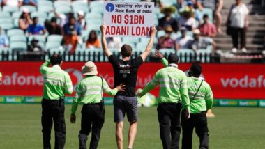 Security Breach! Protestor Invades Pitch With 'no $1bn Adani loan' Poster During India vs Australia 1st ODI 2020 (Watch Video)