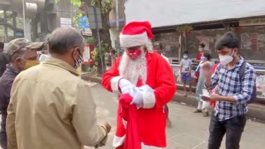 Mumbai: Man Dressed As Santa Claus Distributes Sanitisers, Masks at Rani Lakshmi Chowk