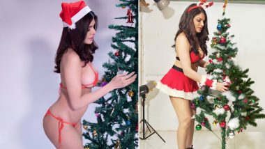 XXX-Tra Hot OnlyFans Celeb Sherlyn Chopra Turns Into Sexy Santa Decorating Xmas Tree for Christmas 2020 in Tiny Red String Bikini, View Pics