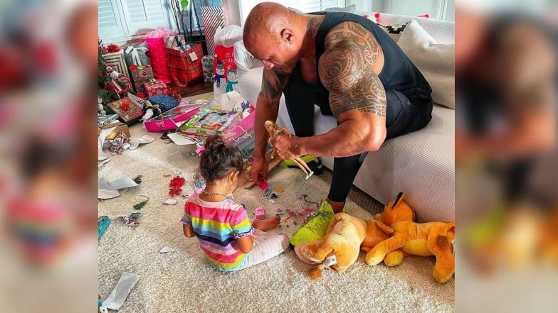 Dwayne Johnson Plays With Barbie Dolls 