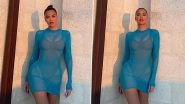 Khloe Kardashian Shows Off Her Sexy Curves in a Sheer Blue Skintight Coverup (View Pics)