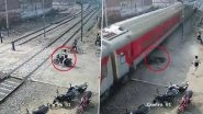Trying to Cross a Railway Crossing? This Man Tried to Do That and Had His Bike Crushed Under a Train While He Had a Narrow Escape! Watch Video