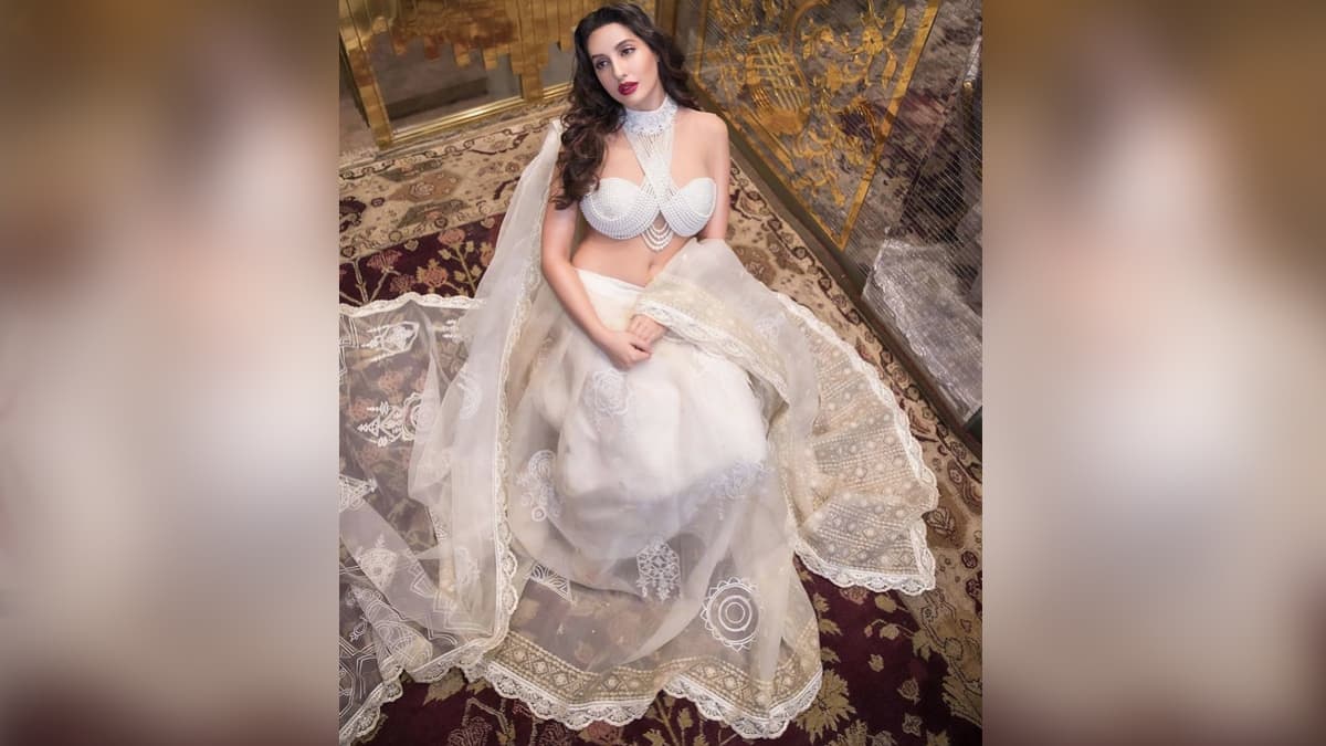 Nora Fatehi in pearl blouse and chikankari lehenga will leave you  spellbound. New video - India Today