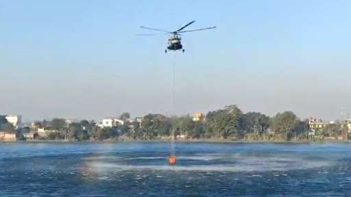 Dzouku Valley Wildfire: IAF Helicopter Refills Bambi Bucket From Lake Near Dimapur To Douse the Raging Fire at Manipur-Nagaland Border (Watch Video)