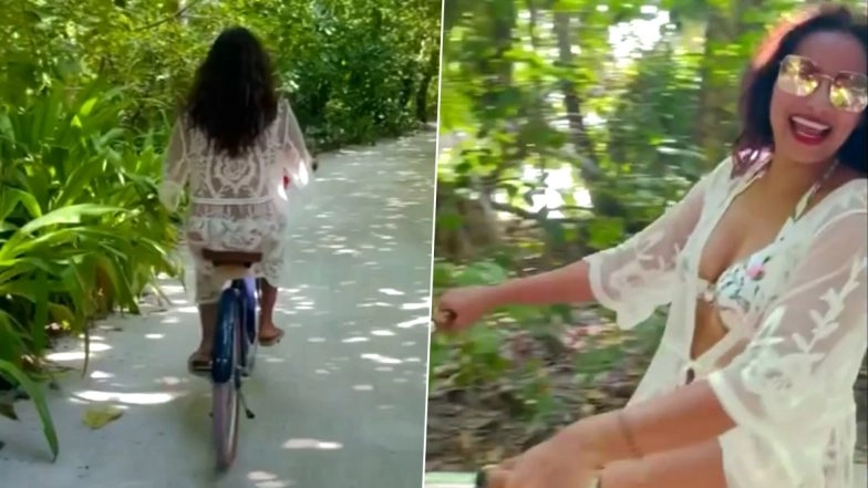Bipasha Basu Enjoys a Fun Cycling Session Around Maldives but It Is Her Sexy Outfit That Has Our Heart (Watch Video)