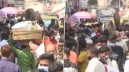 COVID-19 Surge in Maharashtra: People Seen Flouting Social Distancing Norms at Mumbai&rsquo;s Crawford Market; Cops Distribute Free Masks, Impose Fine of Rs 200 (See Pics)