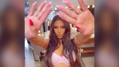 Kim Kardashian Looks Super Hot As She Strikes a Pose in Pink Lingerie (See Pic)
