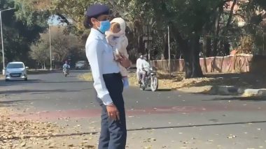 Constable Priyanka Monitors Traffic in Chandigarh While Holding Child On Her Shoulder, Video Goes Viral