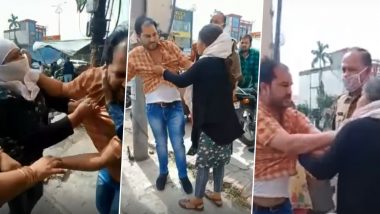 Meerut Woman Thrashes Husband in Public After She Catches Him Red-Handed Buying Clothes For His Girlfriend (Watch Video)