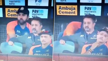 Rohit Sharma Caught Eating While Hiding Behind Support Staff Member During IND vs ENG 2nd T20I (Watch Video)