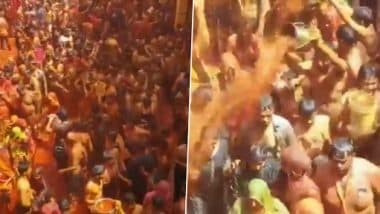 Holi 2021 Celebrations: Devotees Play ‘Kapda Fad’ Holi in Premises of Dauji Temple in Baldeo Area of Mathura District in Uttar Pradesh (Watch Video)