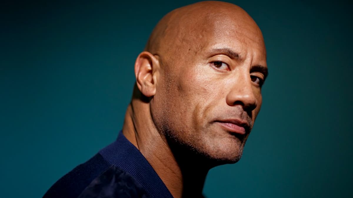 Dwayne The Rock Johnson says his production company will stop using real  guns after deadly Rust shooting - CBS News