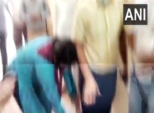 India News | Noida: Families of COVID Patients Touch Feet of CMO, Ask for Remdesivir