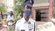 India News | Hyderabad Traffic Cop Wins Hearts After Video of Him Offering Food to Poor Goes Viral
