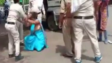 India News | Madhya Pradesh: Police Trash Woman for Not Wearing Mask, 2 Cops Suspended